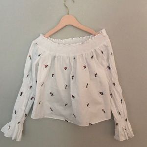 Off the shoulder blouse with embroidered flowers